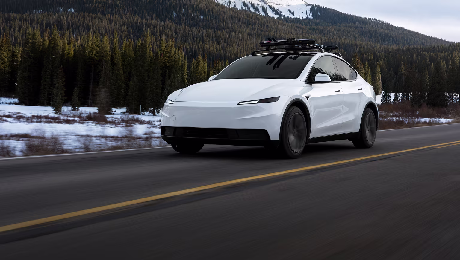Tesla Model Y in a snowy landscape